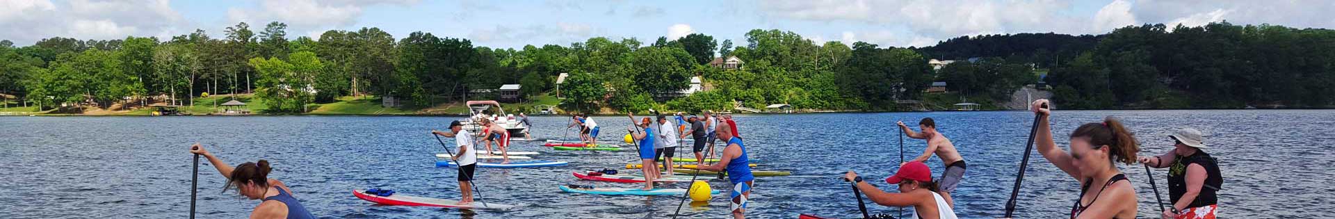 Smith Lake Park Paddle Boarders on the water racing