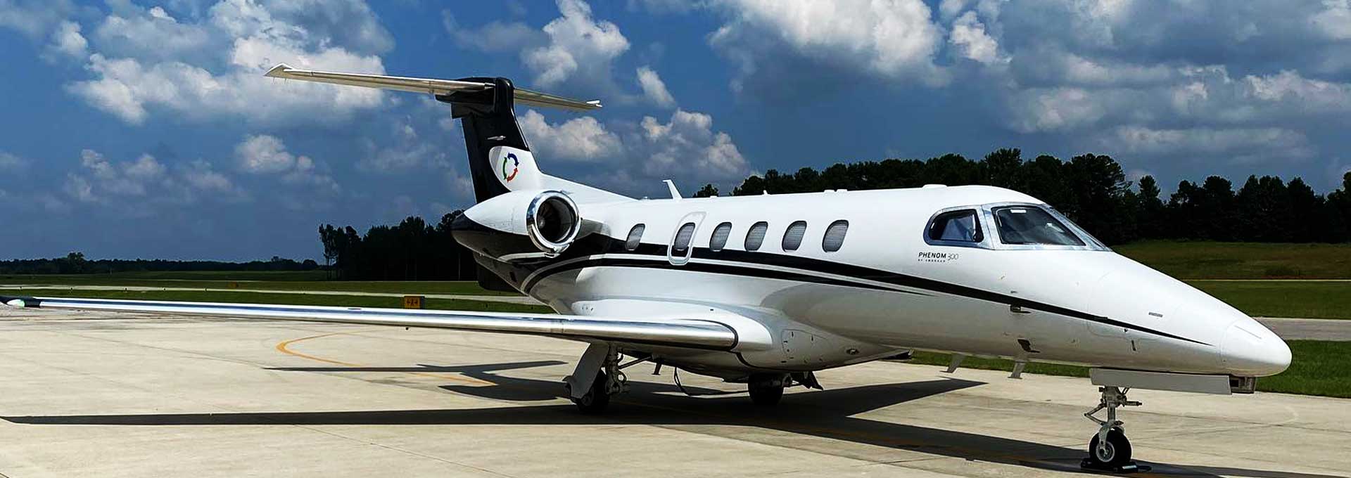 phenom 300 jet on the tarmac at CRA